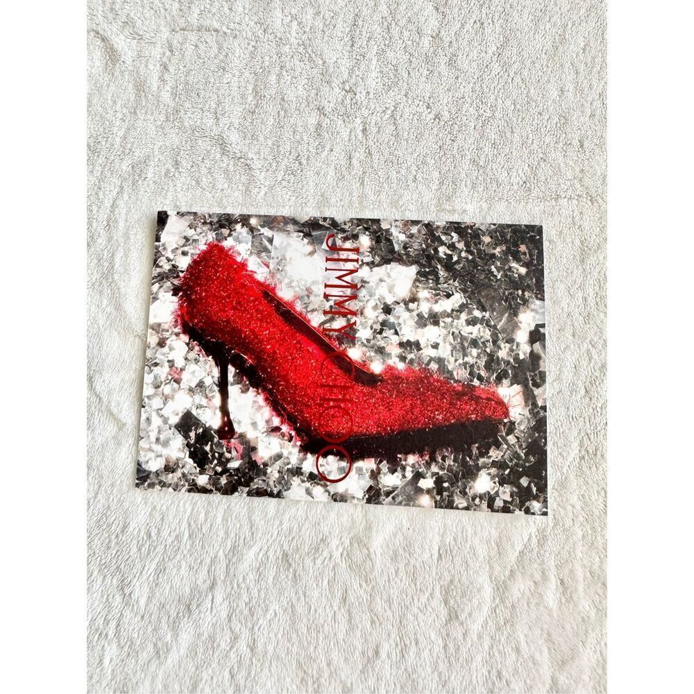 Jimmy Choo advertisement postcard with red, ruby slipper high heel ￼